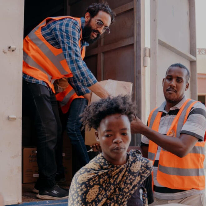 Sudanese American Physician Association SAPA volunteers help get people situated
